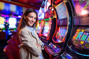 A close-up shot of golden coins falling around a spinning roulette wheel, representing immersive casino action at GEMJLL.